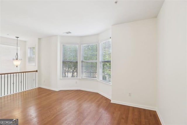 6080 Indian Wood Cir, Mableton, GA 30126 - empty room featuring baseboards and wood finished floors
