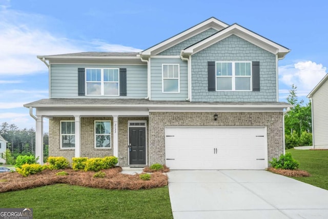 3135 Ellenton Dr, Lithia Springs, GA 30122 - craftsman house with driveway, an attached garage, a front lawn, and brick siding