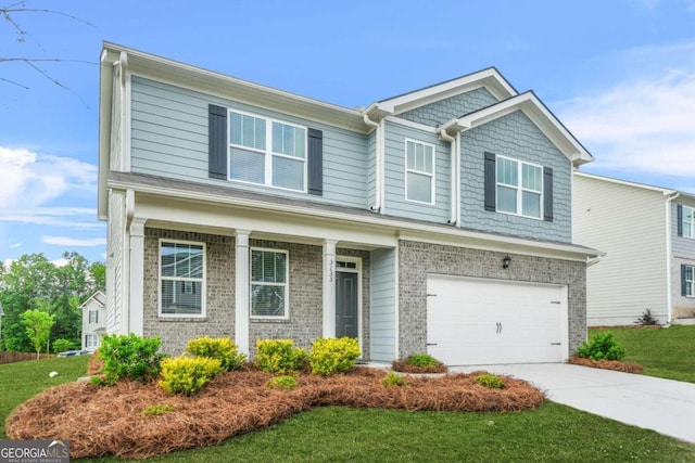 3135 Ellenton Dr, Lithia Springs, GA 30122 - craftsman-style house with concrete driveway, a garage, brick siding, and a front lawn