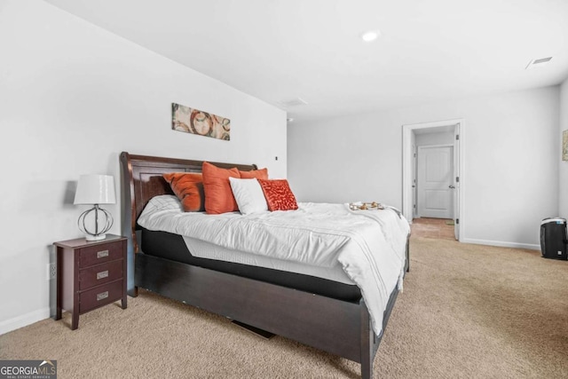 3135 Ellenton Dr, Lithia Springs, GA 30122 - bedroom featuring light carpet and baseboards