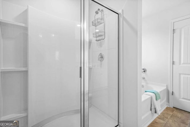 3135 Ellenton Dr, Lithia Springs, GA 30122 - full bath with a shower stall and a bath