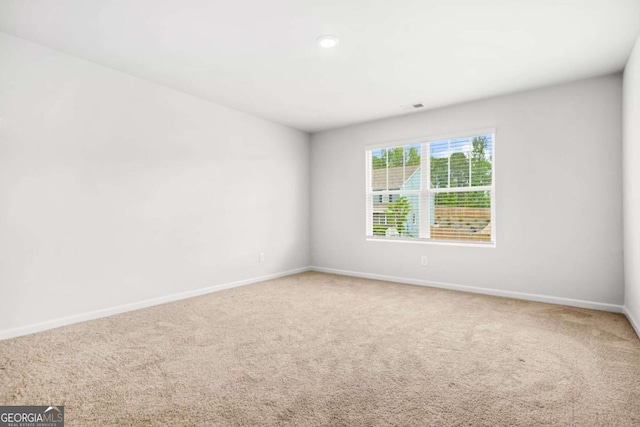 3135 Ellenton Dr, Lithia Springs, GA 30122 - carpeted empty room featuring baseboards and recessed lighting
