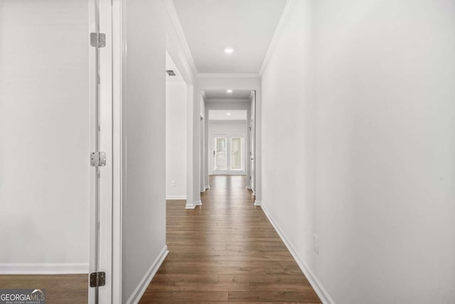 3135 Ellenton Dr, Lithia Springs, GA 30122 - hall featuring crown molding, dark wood-type flooring, and recessed lighting
