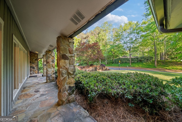 view of patio featuring visible vents