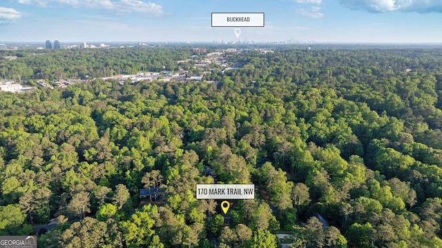 aerial view featuring a forest view