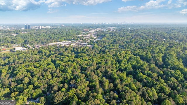 aerial view featuring a view of trees