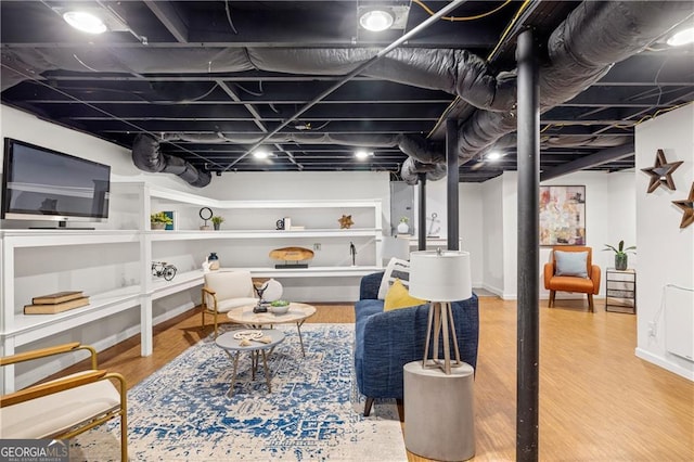 finished basement with wood finished floors