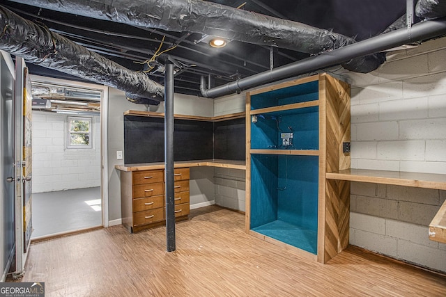 basement with wood finished floors
