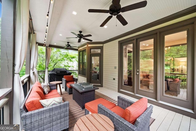 deck featuring an outdoor hangout area, ceiling fan, and a grill