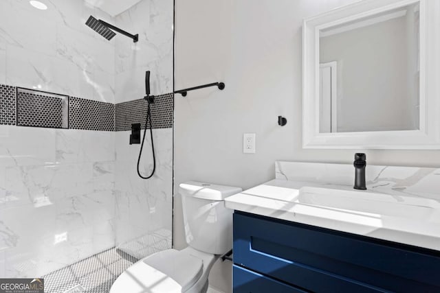 353 Old Rosser Rd, Stone Mountain, GA 30087 - full bathroom with a marble finish shower, vanity, and toilet
