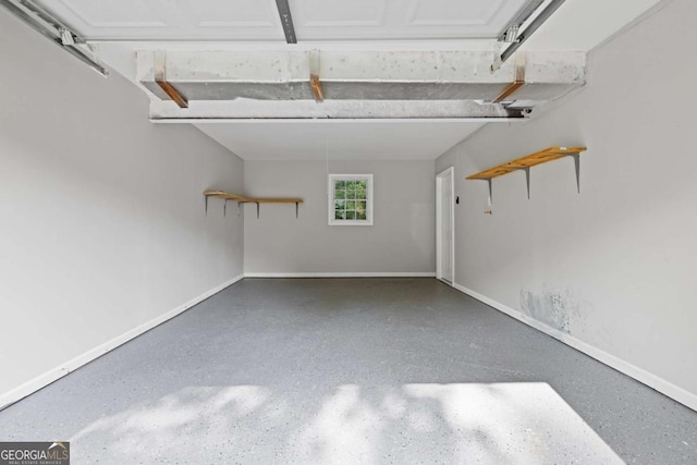353 Old Rosser Rd, Stone Mountain, GA 30087 - garage featuring baseboards