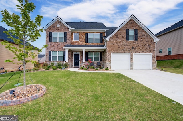 3236 Papyrus Palm Rd, Loganville, GA 30052 - view of front of house featuring brick siding, driveway, a front lawn, and a garage