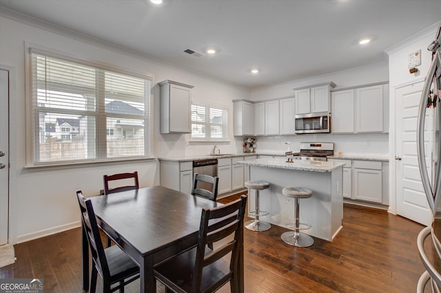 3236 Papyrus Palm Rd, Loganville, GA 30052 - bedroom with ensuite bath, carpet floors, baseboards, a tray ceiling, and visible vents