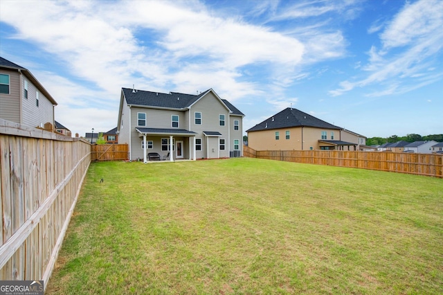 3236 Papyrus Palm Rd, Loganville, GA 30052 - back of house featuring a yard, a patio, and a fenced backyard