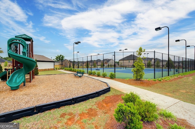 3236 Papyrus Palm Rd, Loganville, GA 30052 - community play area with fence and a tennis court