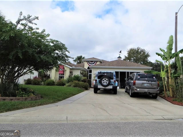 view of car parking featuring a garage