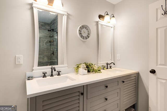 full bath featuring double vanity and a sink