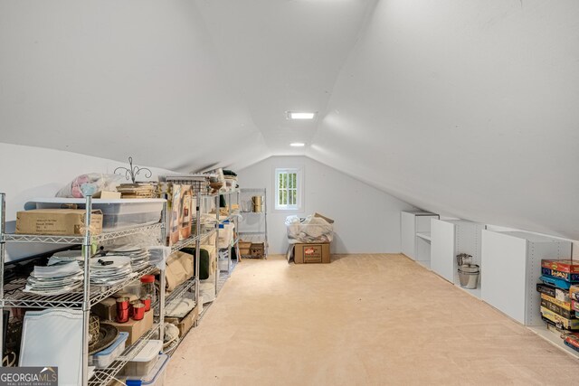 additional living space with vaulted ceiling