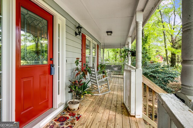 deck with covered porch