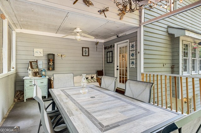 exterior space with a ceiling fan and outdoor dining area
