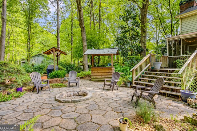 view of patio with stairway and a deck
