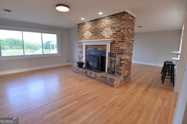 2647 Mount Carmel Rd, Hampton, GA 30228 - unfurnished living room with baseboards, recessed lighting, wood finished floors, and visible vents
