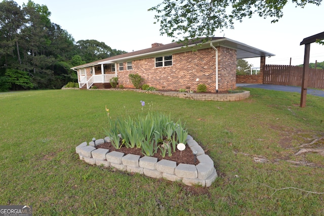 2647 Mount Carmel Rd, Hampton, GA 30228 - view of yard featuring fence and an attached carport