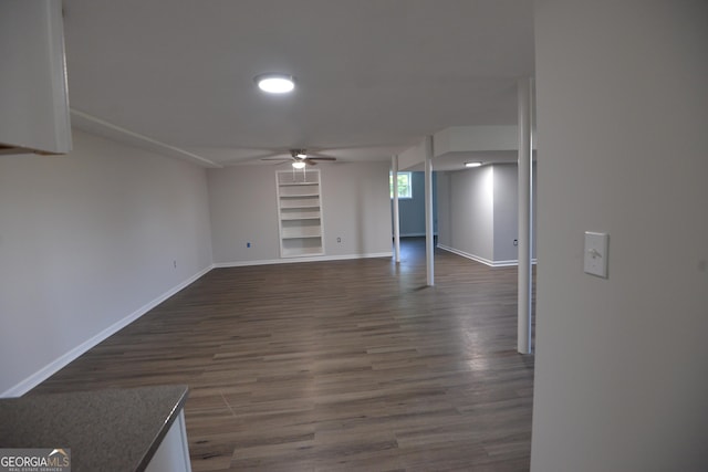2647 Mount Carmel Rd, Hampton, GA 30228 - empty room with baseboards, a ceiling fan, and dark wood finished floors