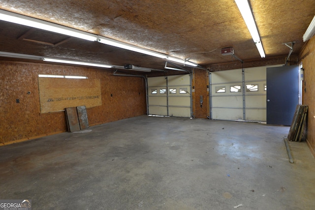 2647 Mount Carmel Rd, Hampton, GA 30228 - garage with a garage door opener