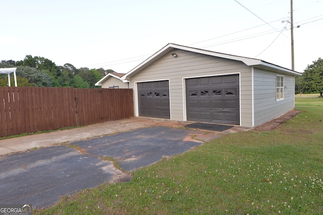 2647 Mount Carmel Rd, Hampton, GA 30228 - detached garage featuring fence