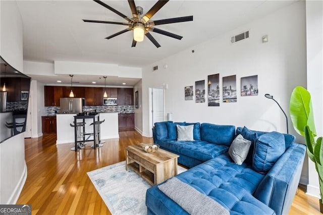 950 W Peachtree St NW Unit 904, Atlanta, GA 30309 - living area with ceiling fan, light wood-type flooring, and recessed lighting