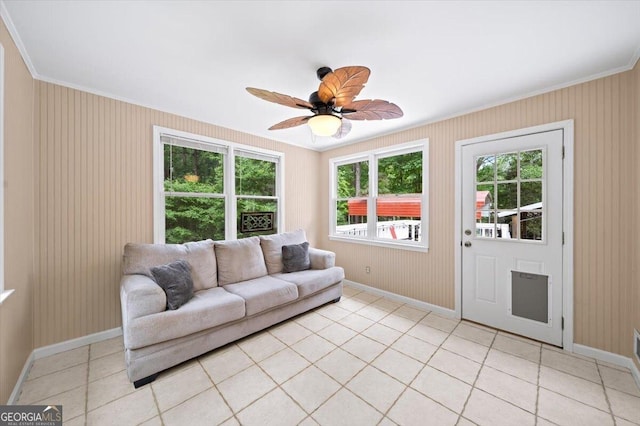 320 Williamsburg Cir, Mcdonough, GA 30253 - living room with baseboards, ornamental molding, ceiling fan, and light tile patterned flooring