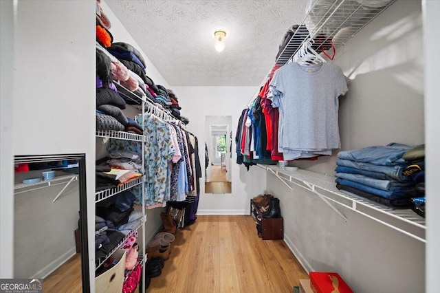 320 Williamsburg Cir, Mcdonough, GA 30253 - spacious closet featuring wood finished floors