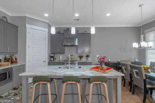 1914 Coal Pl, Atlanta, GA 30318 - kitchen featuring crown molding, a sink, gray cabinets, and a notable chandelier