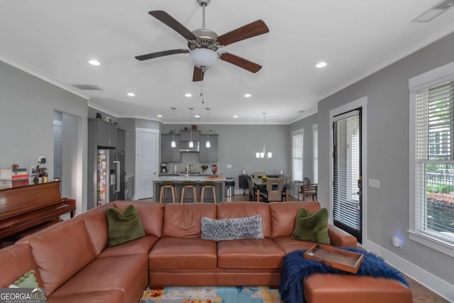 1914 Coal Pl, Atlanta, GA 30318 - living room featuring baseboards, a ceiling fan, crown molding, and recessed lighting