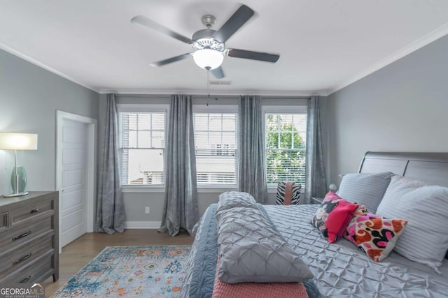 1914 Coal Pl, Atlanta, GA 30318 - bedroom with visible vents, ornamental molding, wood finished floors, baseboards, and a ceiling fan