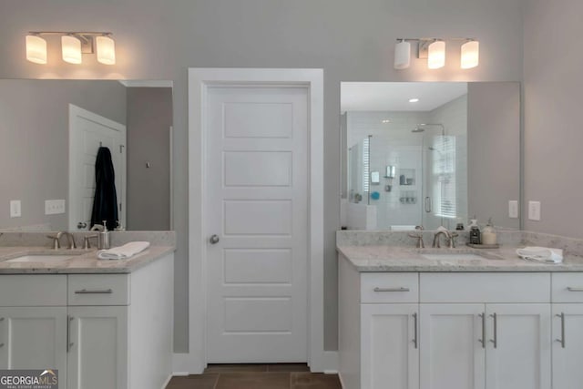 1914 Coal Pl, Atlanta, GA 30318 - full bathroom with two vanities, a shower stall, and a sink