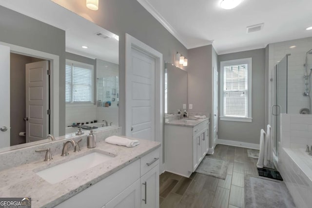 1914 Coal Pl, Atlanta, GA 30318 - full bathroom with visible vents, crown molding, vanity, and a shower stall