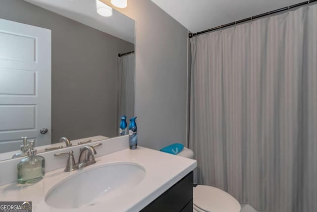 1914 Coal Pl, Atlanta, GA 30318 - full bathroom featuring vanity, toilet, and a shower with shower curtain