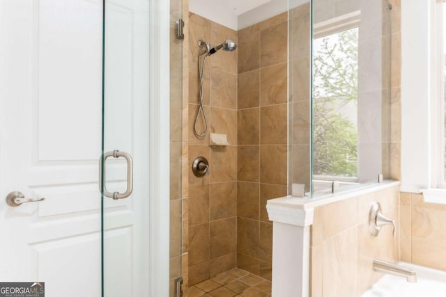 full bath featuring a stall shower
