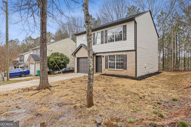 7074 Ravenwood Ln, Lithonia, GA 30038 - view of front facade with concrete driveway, brick siding, and a garage