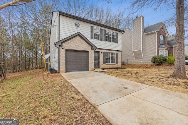 7074 Ravenwood Ln, Lithonia, GA 30038 - traditional-style home with brick siding, a garage, and driveway
