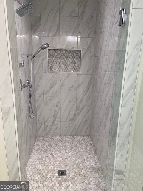 bathroom featuring a stall shower
