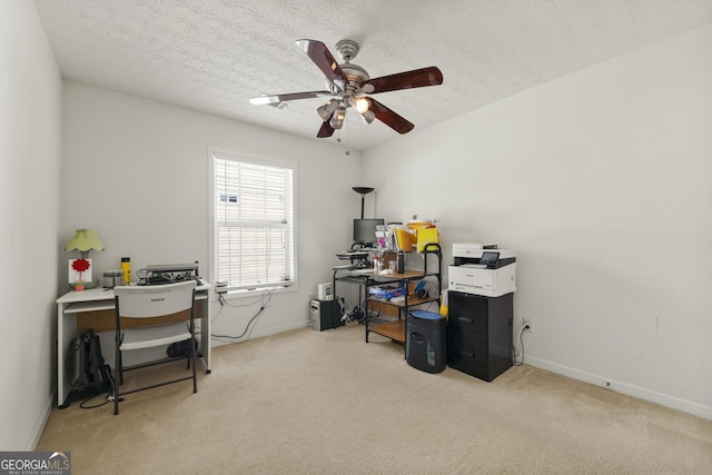 1395 Brisbane Dr, Dacula, GA 30019 - office space with carpet flooring, baseboards, ceiling fan, and a textured ceiling