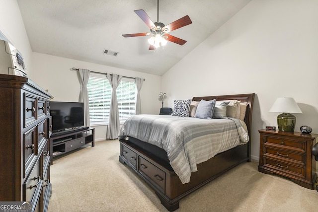 1395 Brisbane Dr, Dacula, GA 30019 - bedroom with light carpet, vaulted ceiling, baseboards, and ceiling fan