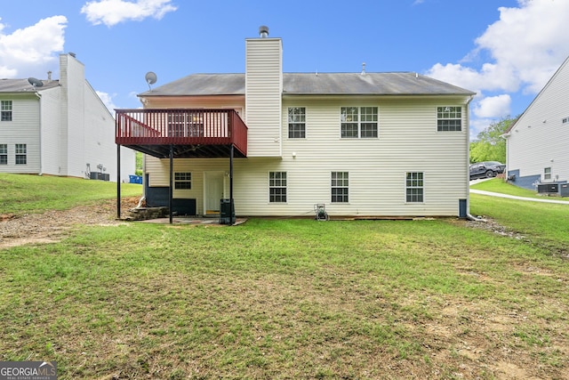 1395 Brisbane Dr, Dacula, GA 30019 - back of property with a deck, a yard, cooling unit, and a chimney