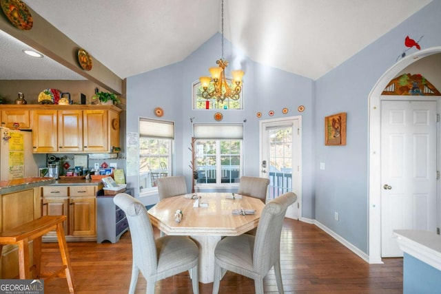 dining space featuring baseboards, high vaulted ceiling, a chandelier, arched walkways, and dark wood finished floors