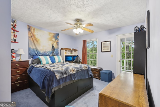 3876 Winners Ct, Marietta, GA 30062 - bedroom featuring carpet flooring, ceiling fan, a textured ceiling, and access to exterior