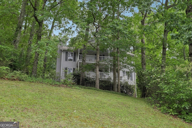 3876 Winners Ct, Marietta, GA 30062 - view of grassy yard featuring a balcony