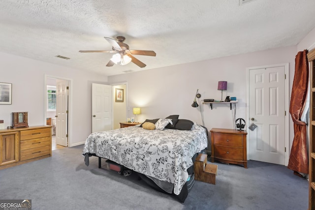 3876 Winners Ct, Marietta, GA 30062 - bedroom with light colored carpet, a textured ceiling, and ceiling fan